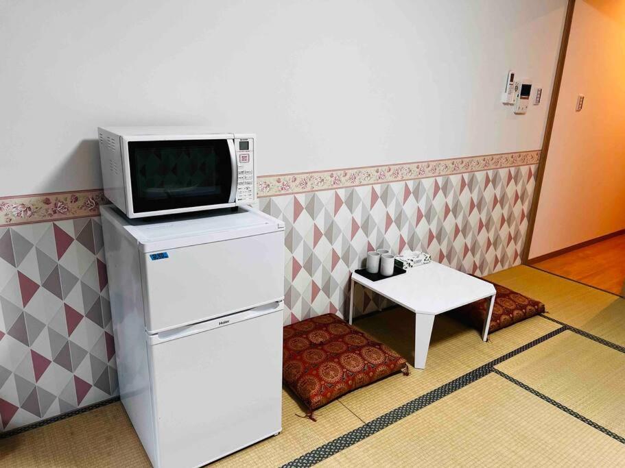 アパート 全新上线花跡民宿4号館102，关西机场直达萩之茶屋出站1分钟！难波、心斋桥4分钟车程！ *