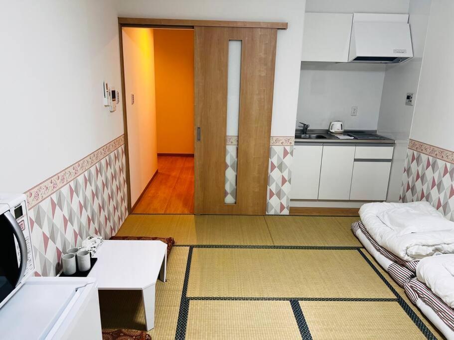 全新上线花跡民宿4号館102，关西机场直达萩之茶屋出站1分钟！难波、心斋桥4分钟车程！ アパート 大阪市